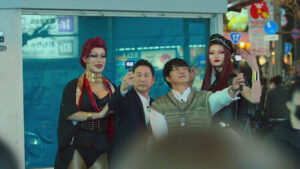 (left to right) Kato Ago Missile, Shin Dong-yup, Sung Si-kyung, and Cerestia Grown in Risque Business: Japan, standing on a street corner in Tokyo.