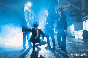 (left to right) Yeom Hye-ran, Jo Byeong-kyu, Yoo Jun-sang, and Kim Sejeong in The Uncanny Counter, all wearing black suits, standing in an alleyway filled with blue mist at night.